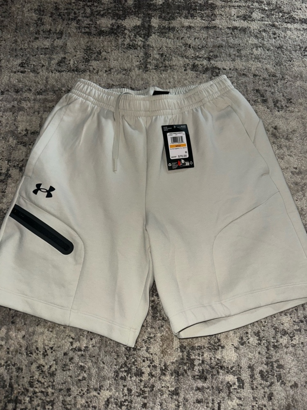 Under Armour Men’s Light Beige Athletic Shorts with Black Accent